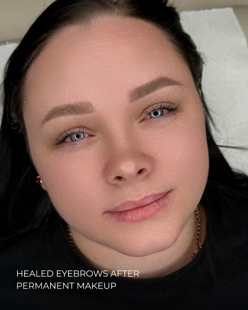 Healed powder brows after permanent makeup — front view